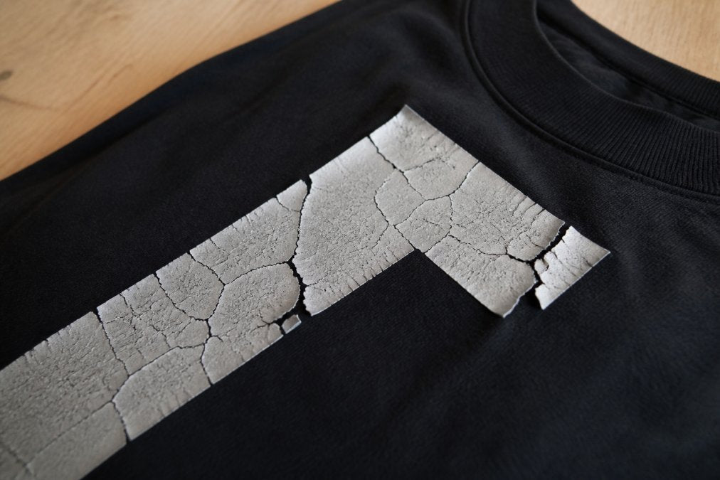 Why Custom Apparel Prints Crack (And How to Fix It)